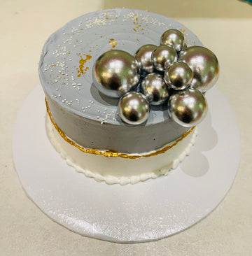 GREY AND WHITE BIRTHDAY CAKE