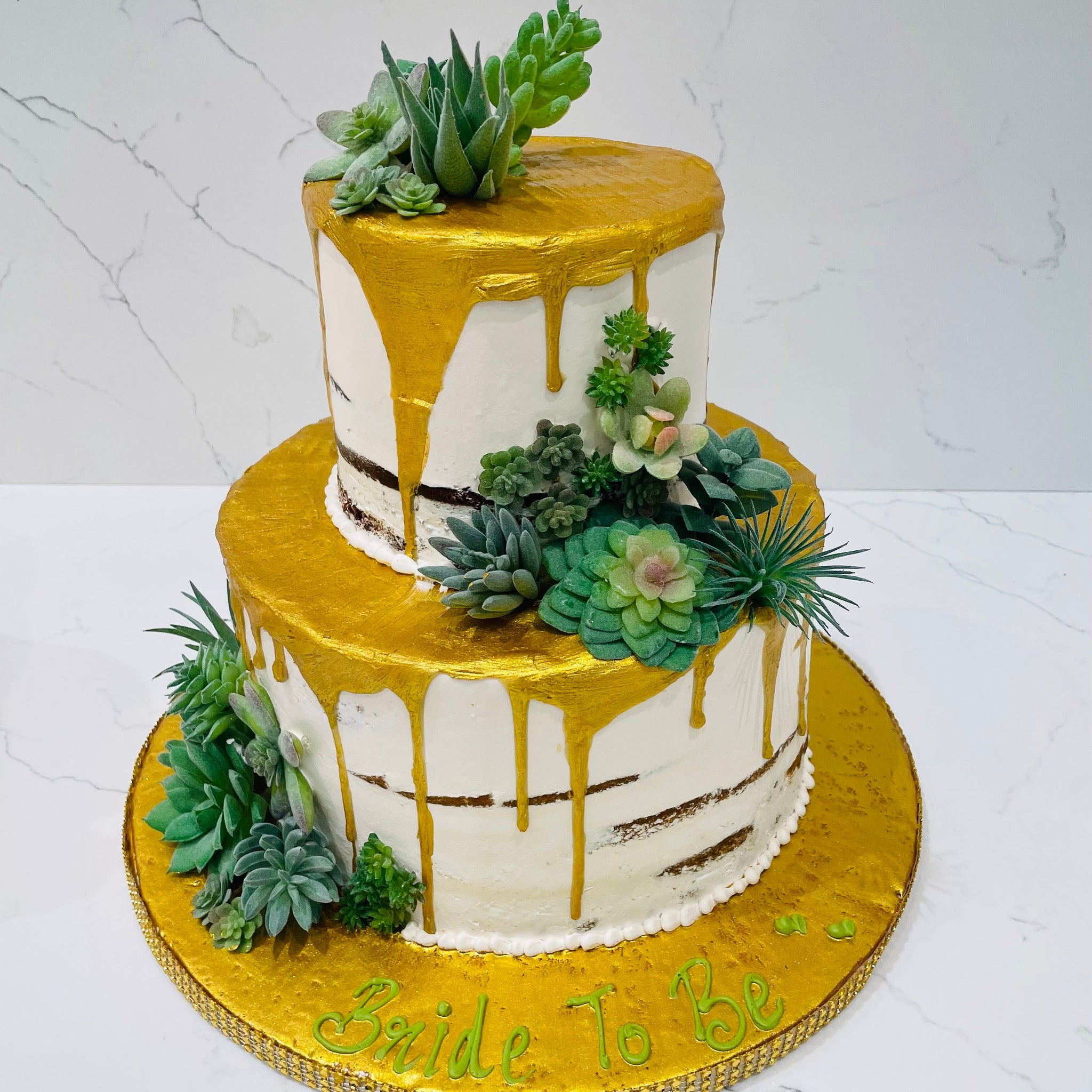 SUCCULENTS TIERED CREAM CAKE