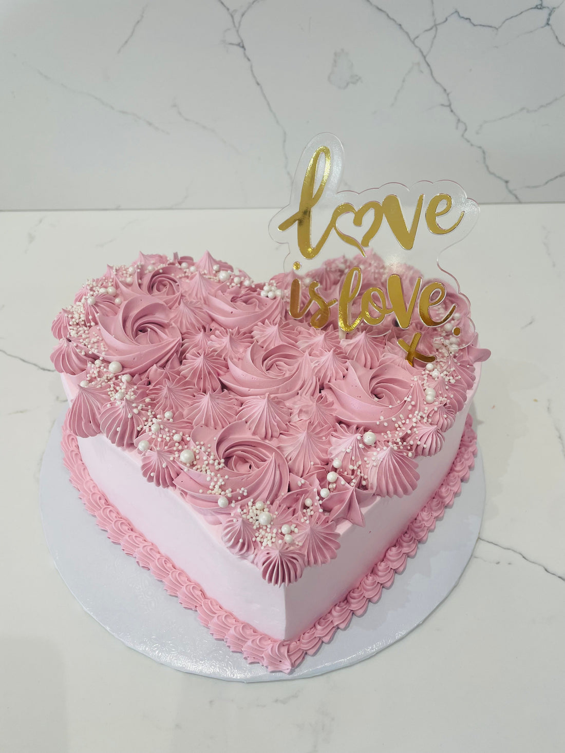 PINK HEART ROSETTE CAKE