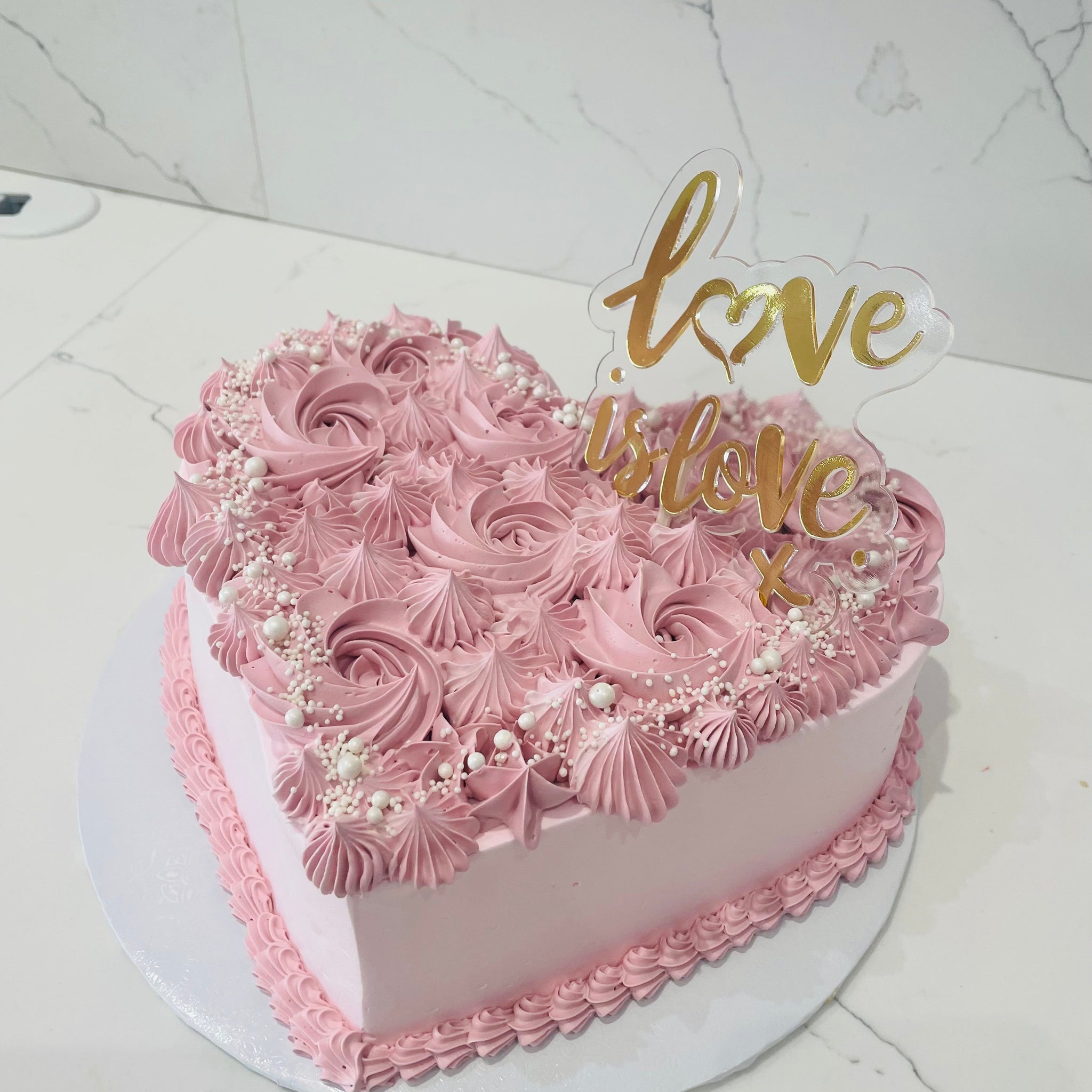 PINK HEART ROSETTE CAKE