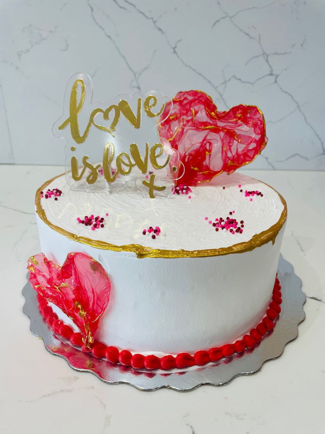 LOVE IS LOVE VALENTINE CAKE