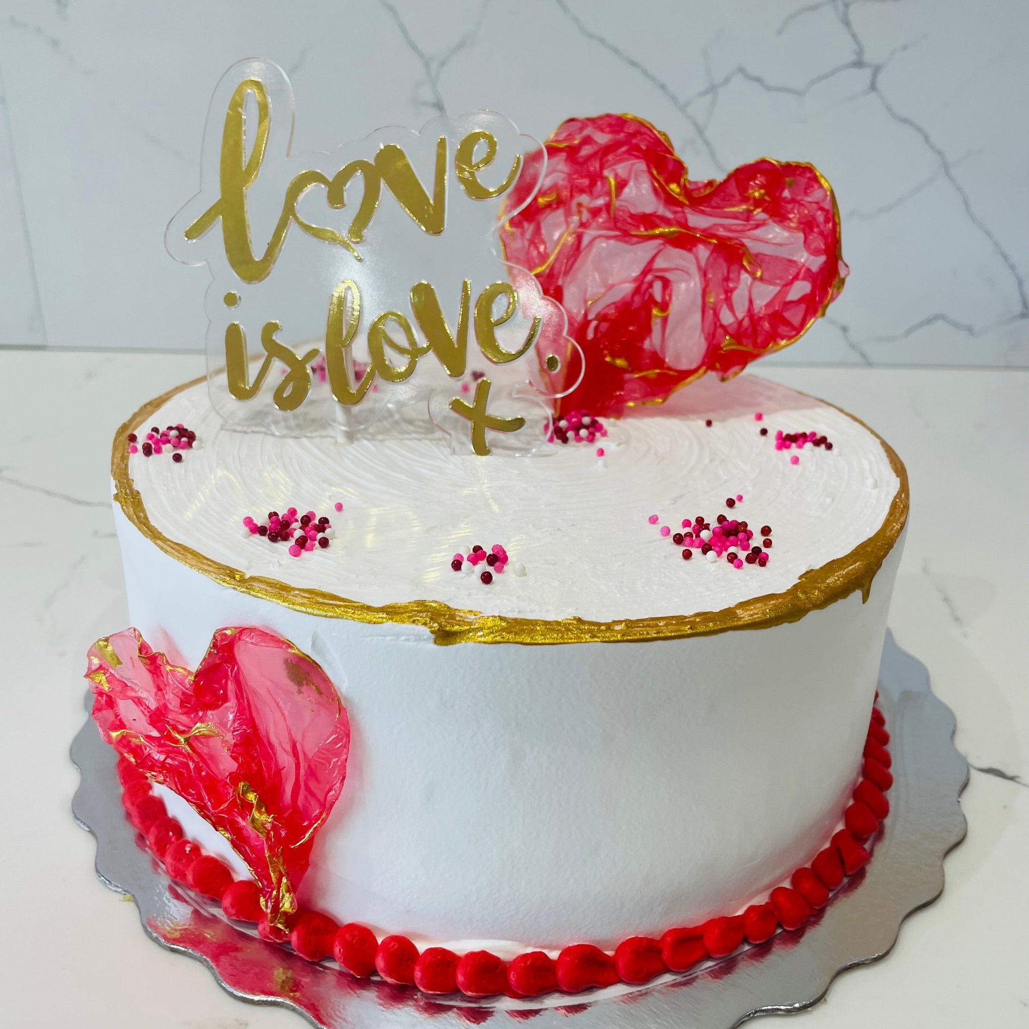 LOVE IS LOVE VALENTINE CAKE