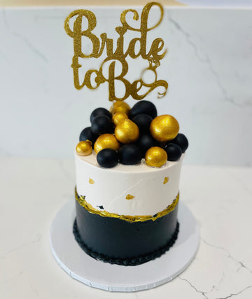 BLACK AND GOLD BRIDE TO BE CAKE