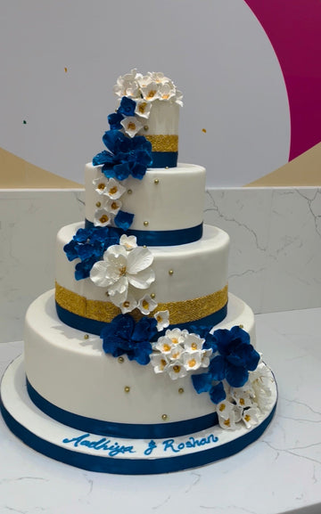 ROYAL BLUE & GOLD WEDDING CAKE