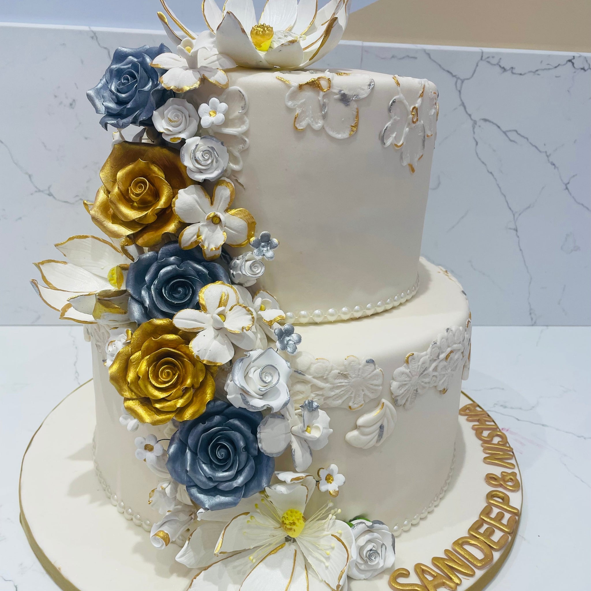IVORY & GOLD FONDANT WEDDING CAKE