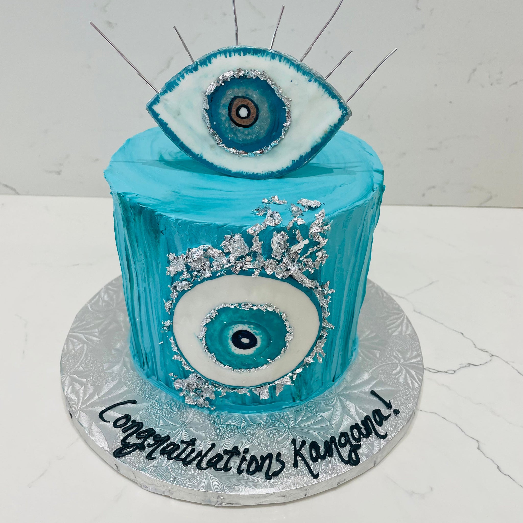 EVIL EYE CREAM CAKE