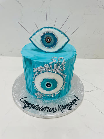 EVIL EYE CREAM CAKE