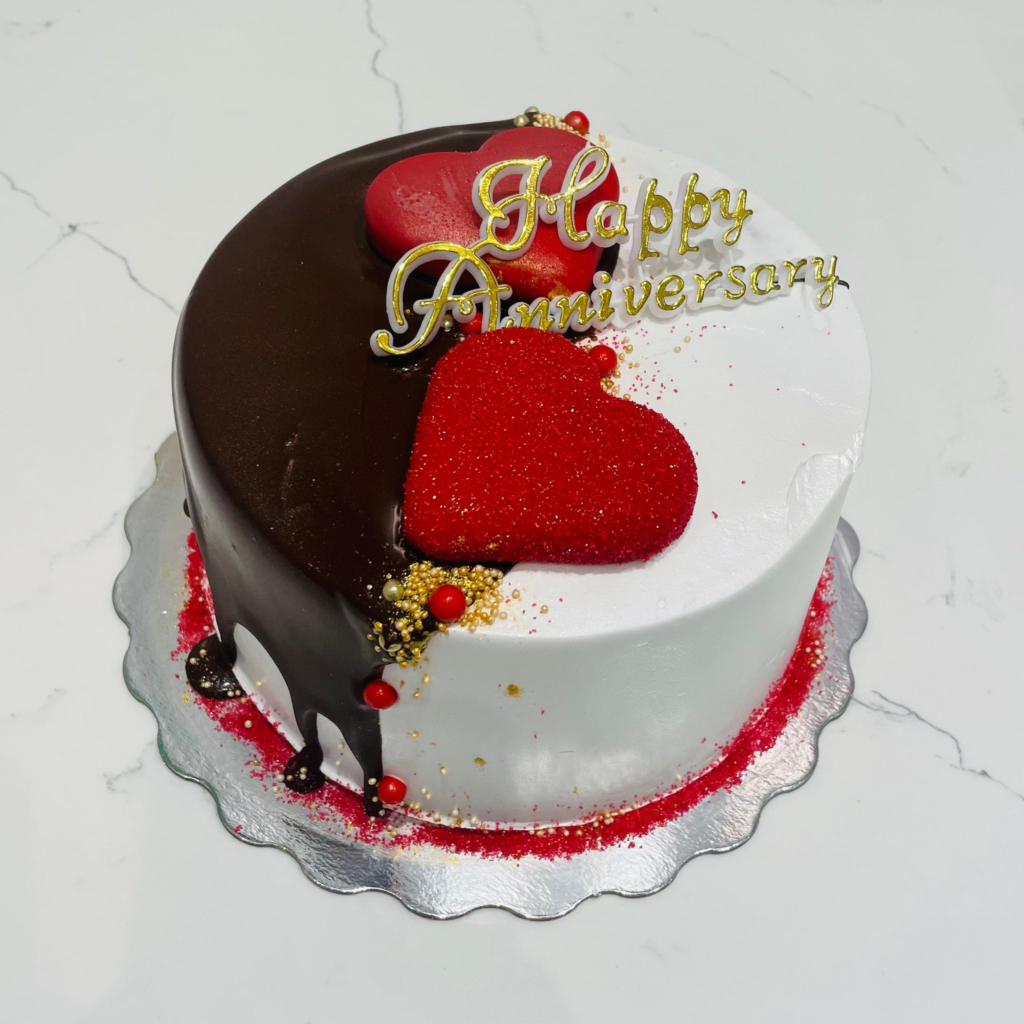 HENRY RED HEART ANNIVERSARY CAKE