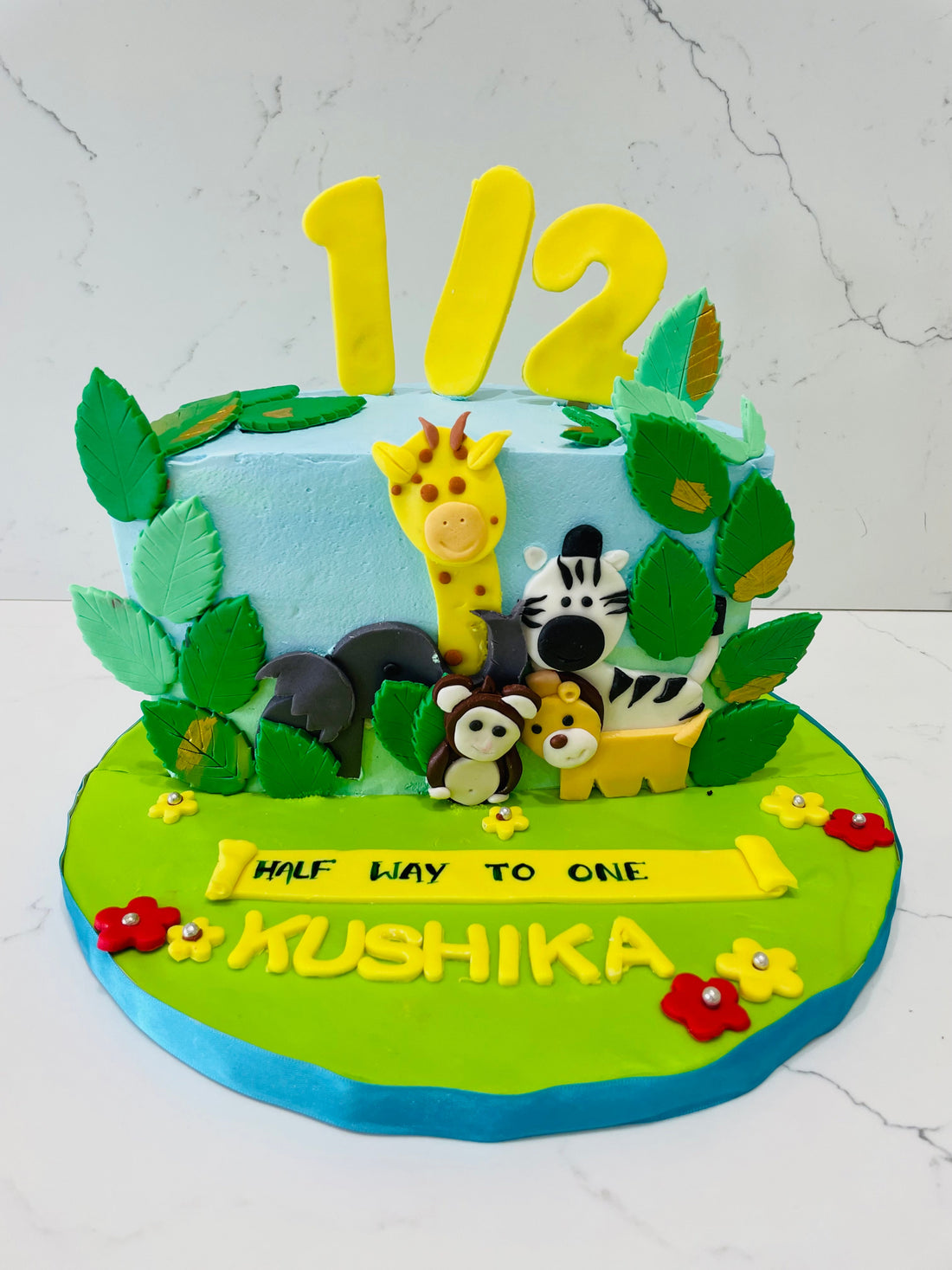 KUSHIKA JUNGLE THEME HALF BIRTHDAY CAKE