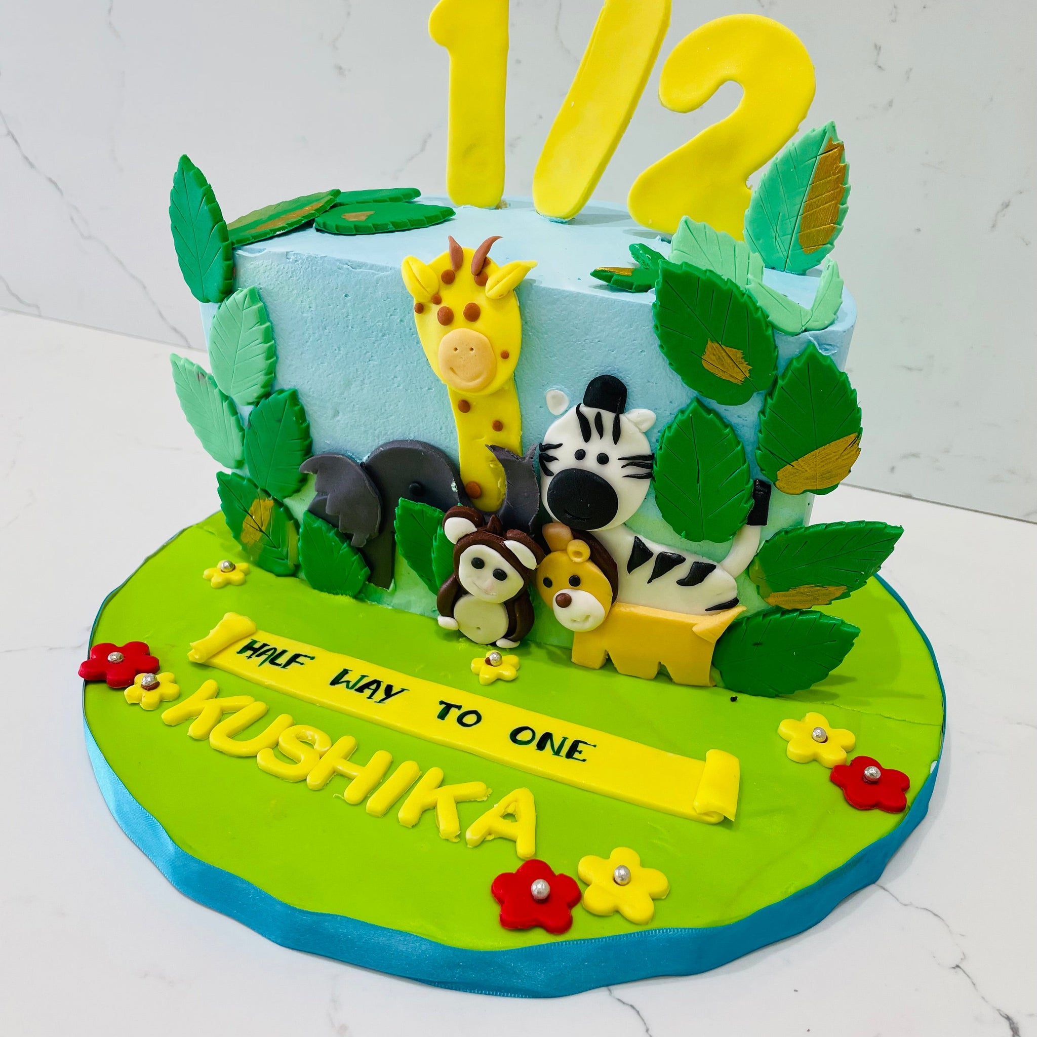 KUSHIKA JUNGLE THEME HALF BIRTHDAY CAKE