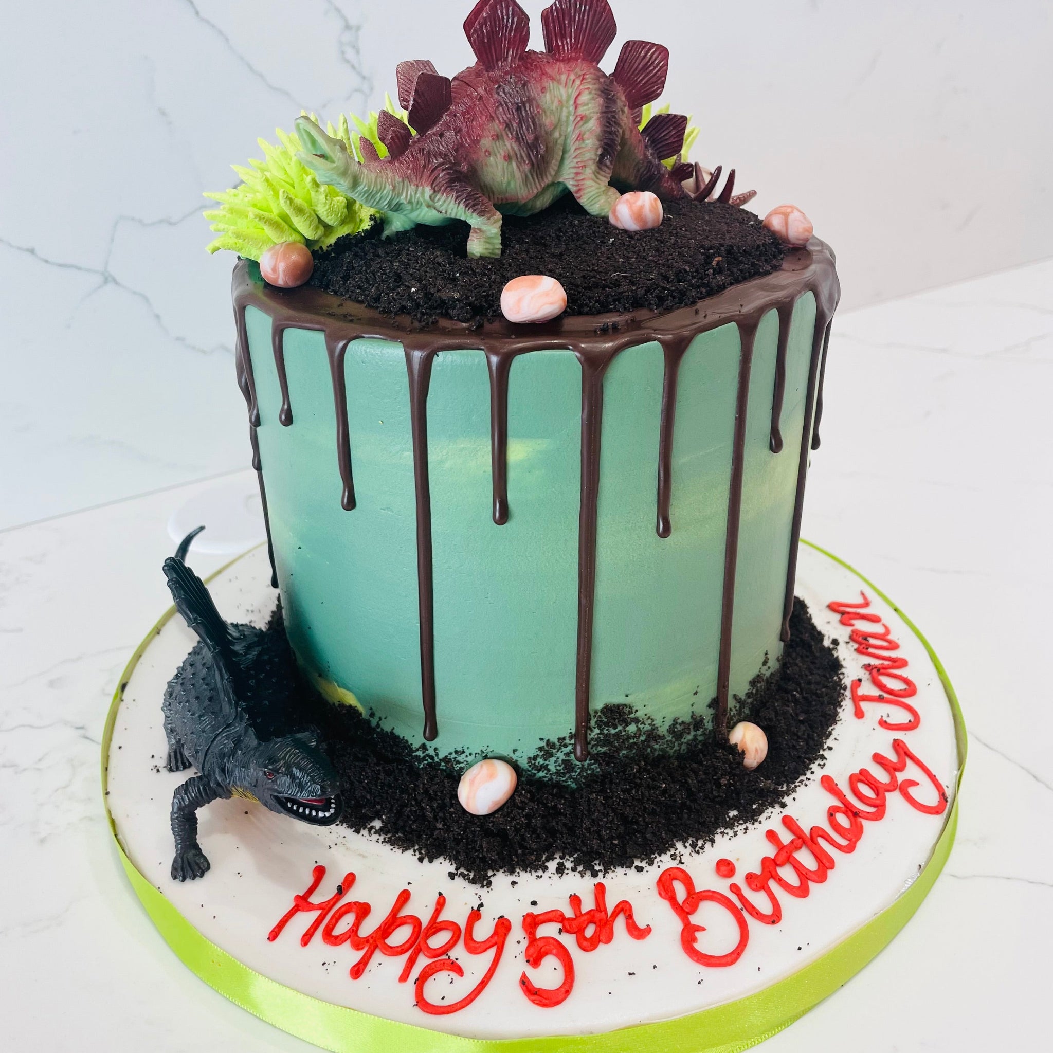 DINOSAUR DRIZZLE CREAM CAKE