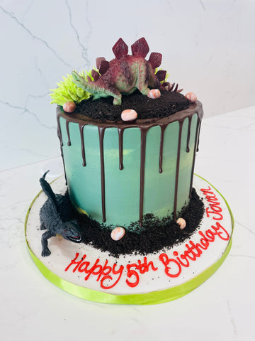 DINOSAUR DRIZZLE CREAM CAKE