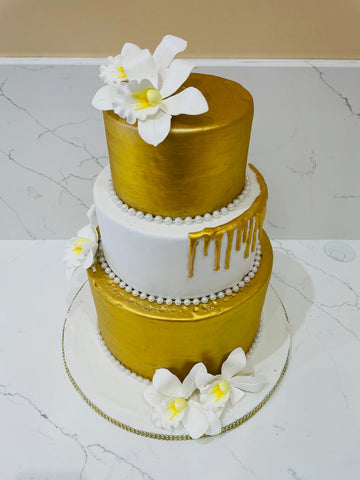 GOLD & WHITE LILLIES FONDANT CAKE