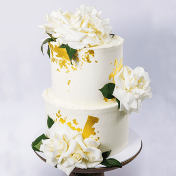 Multi-tier White Floral and Gold Wedding Cake